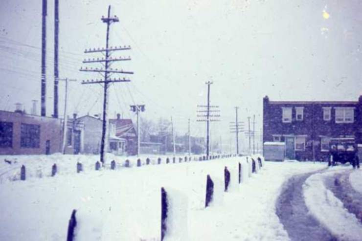 Looking west from South 8th Street north of the railroad tracks at Bulson Street, with rear of Kossuth Street visible at far right, John Yates photo