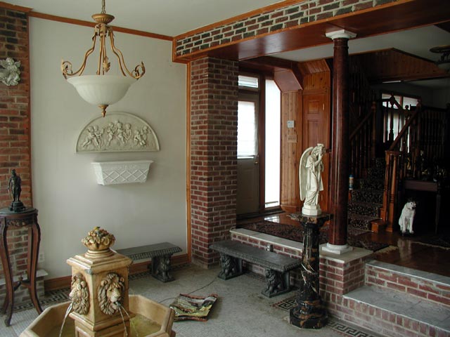 First floor of The White House, front room sunken to street level with tiled floor, July 10, 2004