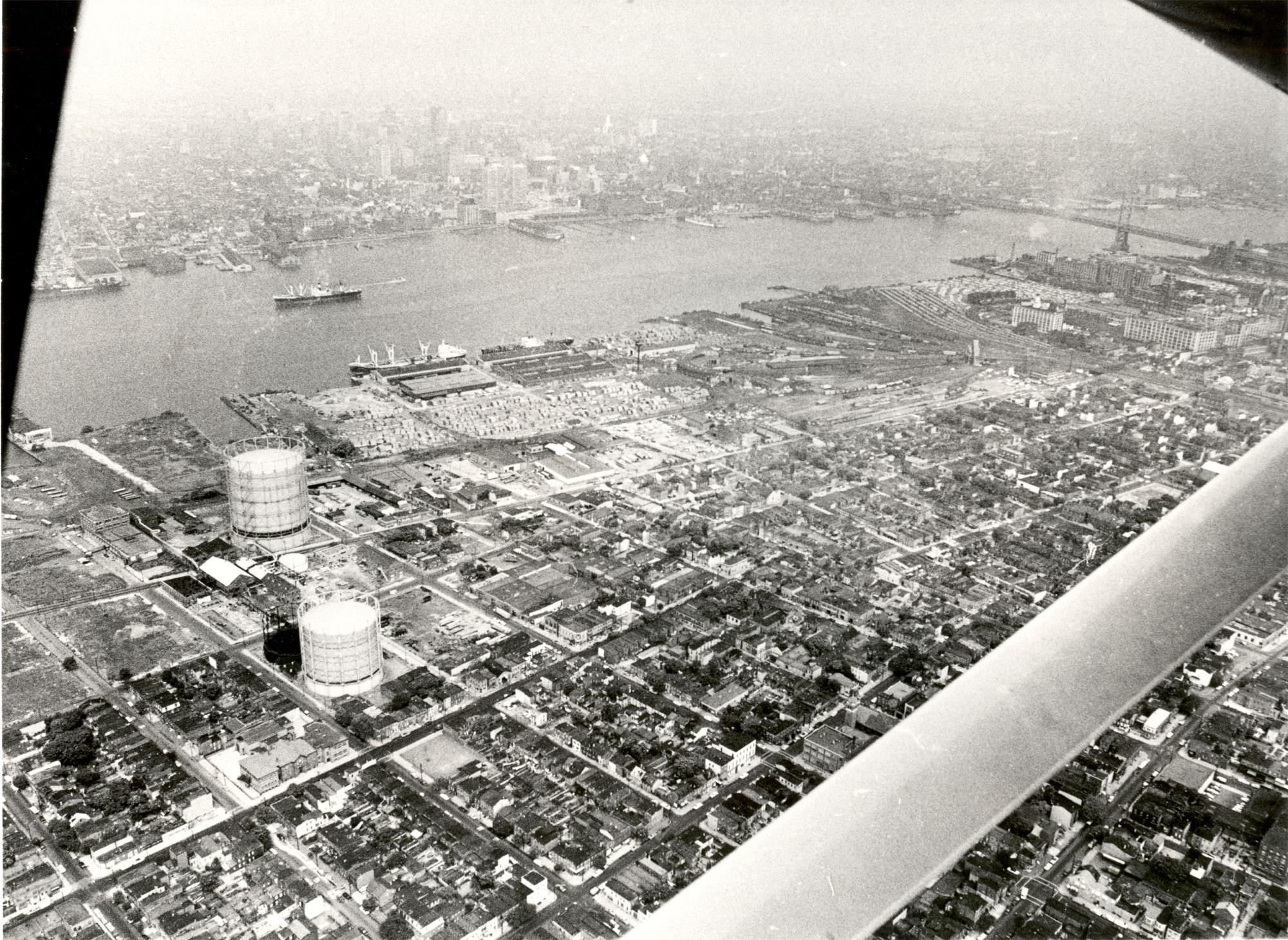 July 7, 1965 aerial view of Camden waterfront south of the Ben Franklin Bridge looking northwest