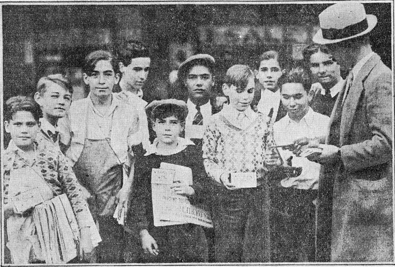 Newsboys receiving tickets for the Camden Shrine Club show at Convention Hall