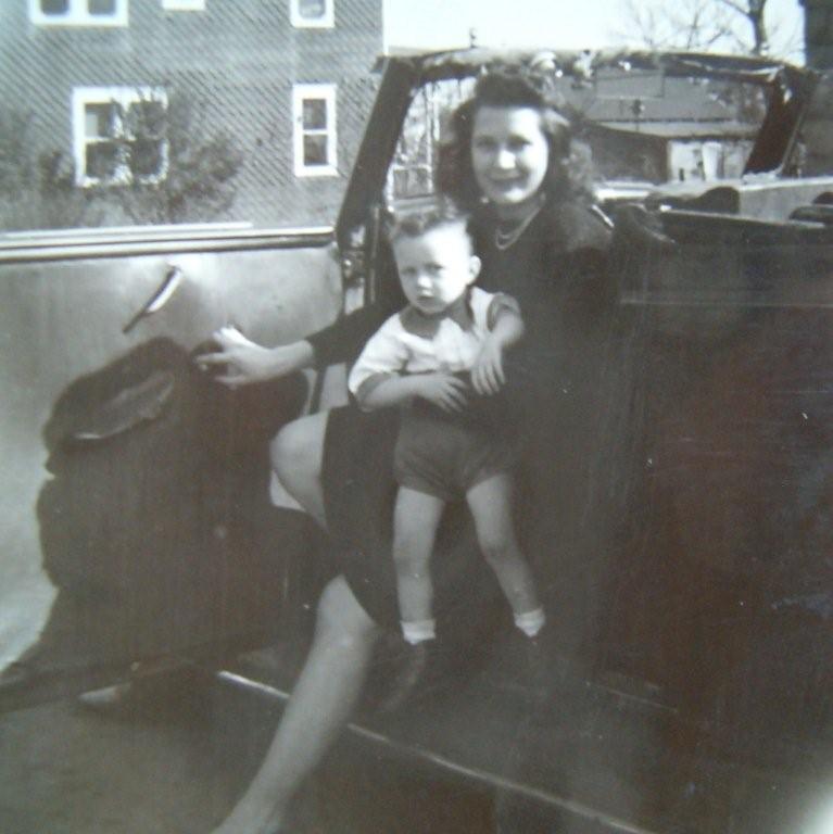 Florence Seddon and young Joe in front of the Ott house on Polk Avenue