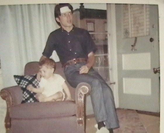 Joe Seddon age 25 with young Mark Hickey inside the Hickey house on 2828 Polk Avenue, 1968