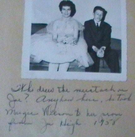 Photo with date written by mother in scrapbook, Garland Wilson family