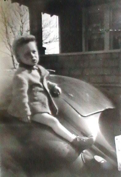 Joe Seddon Jr. in front of the Ott home on Polk Avenue