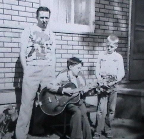 Joe Seddon Sr., Joe Jr. and Sonny Frett of Cramer Hill with guitar