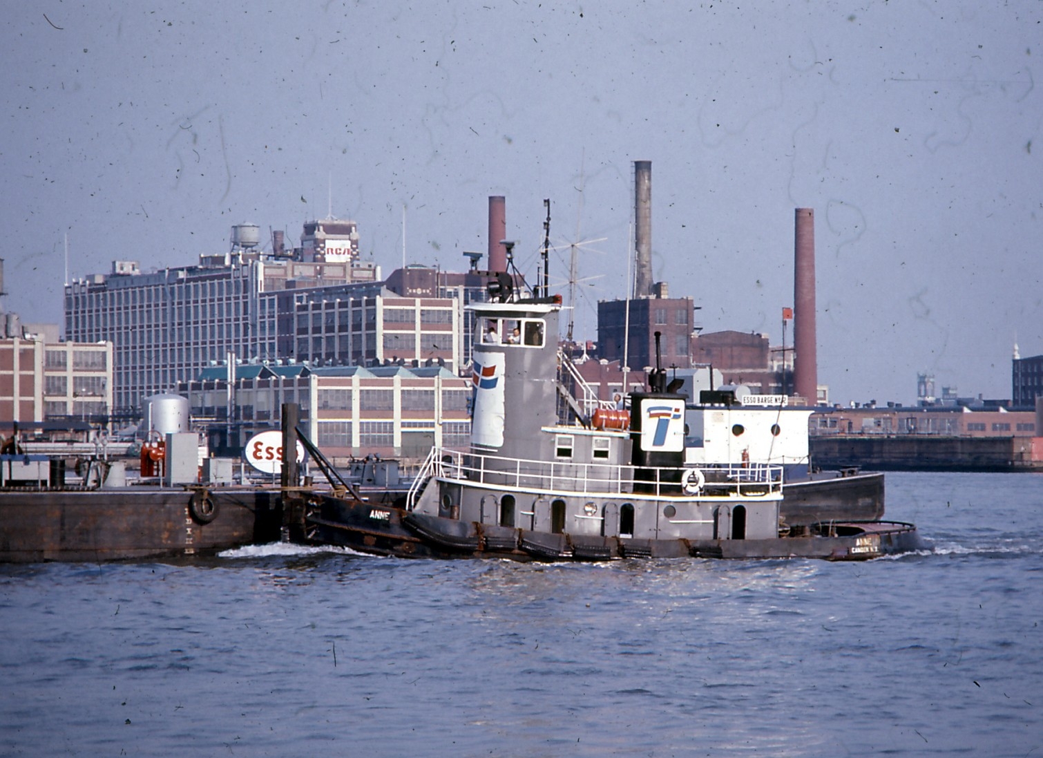 ANNE, a tugboat belonging to Express Marine, 1971 — RCA factory buildings still standing are at rear of photo