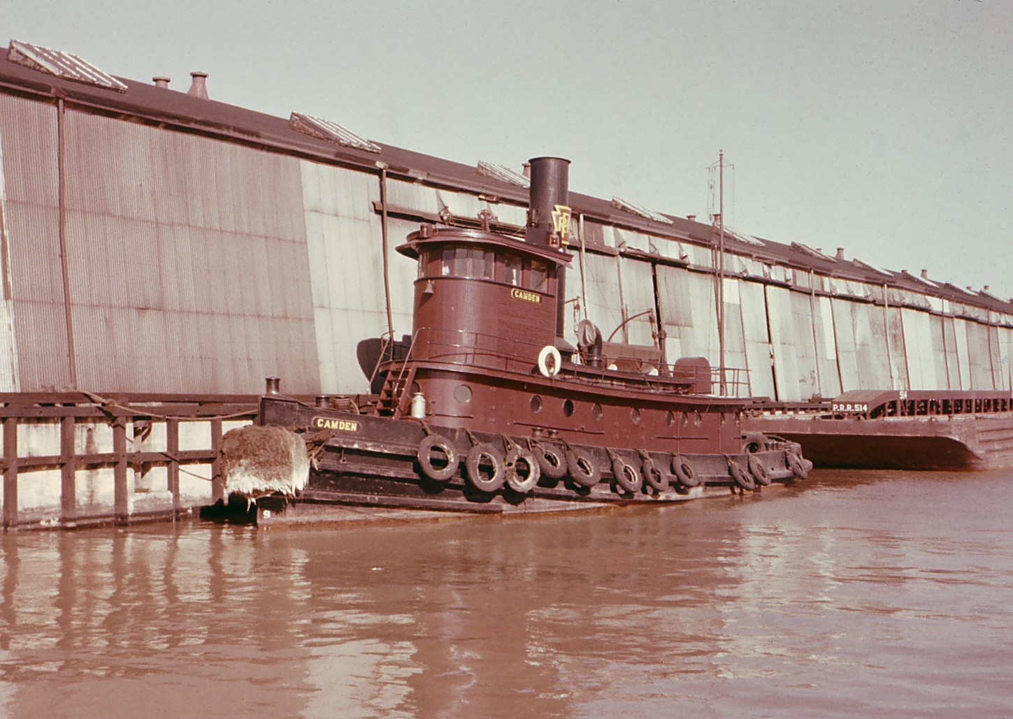 Camden waterfront with tugboat
