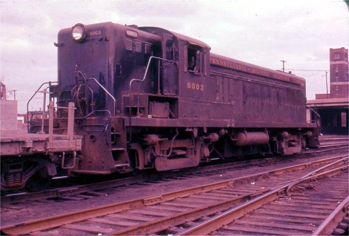 Pennsylvania Reading & Seashore Line diesel pushing freight cars onto a barge at the Kaighn Avenue Pier, Camden