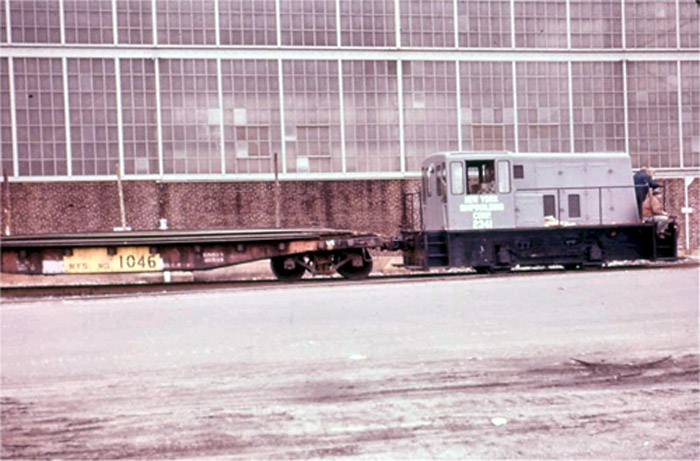 Light diesel switcher with crew at New York Ship, Camden