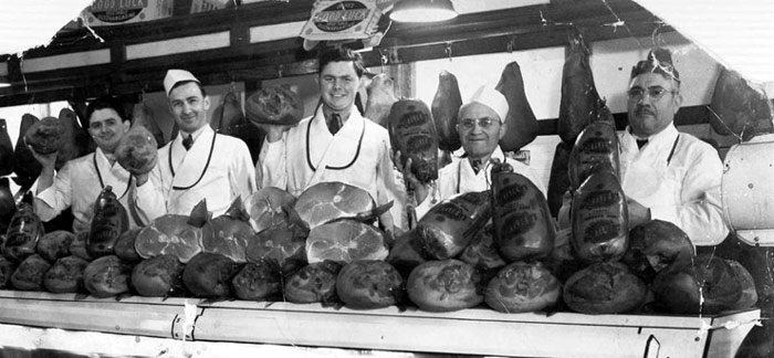 Behind the counter at D.A. Gottlieb & Sons — left to right: Leon Gottlieb, unknown, Gerald Gottlieb, Nathan Lambersky, & John DeFelice