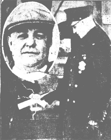 Front of Gottlob Mayer's shop, Hayes Avenue and North Twenty-seventh Street, with Patrolman Joseph Keefe, January 26, 1928