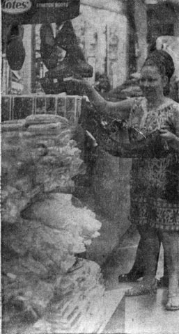 A happy shopper inside Kotlikoff's, 1970s