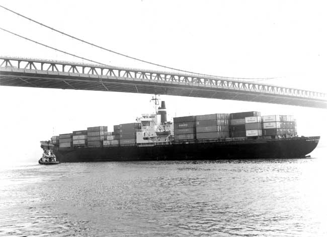 Unknown Curtis Bay tug with container ship, August 1981
