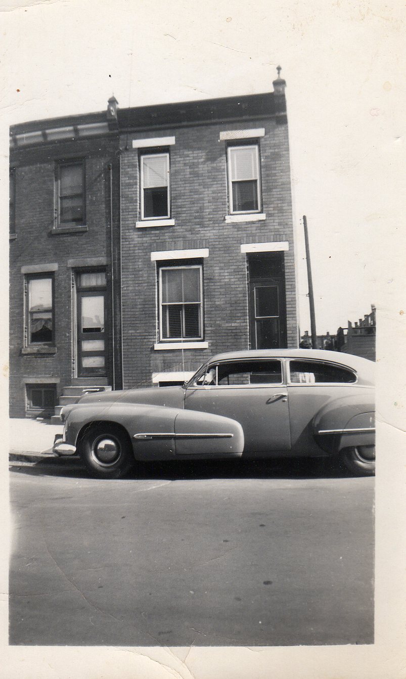 Becoskies' 1948 Oldsmobile in front of house