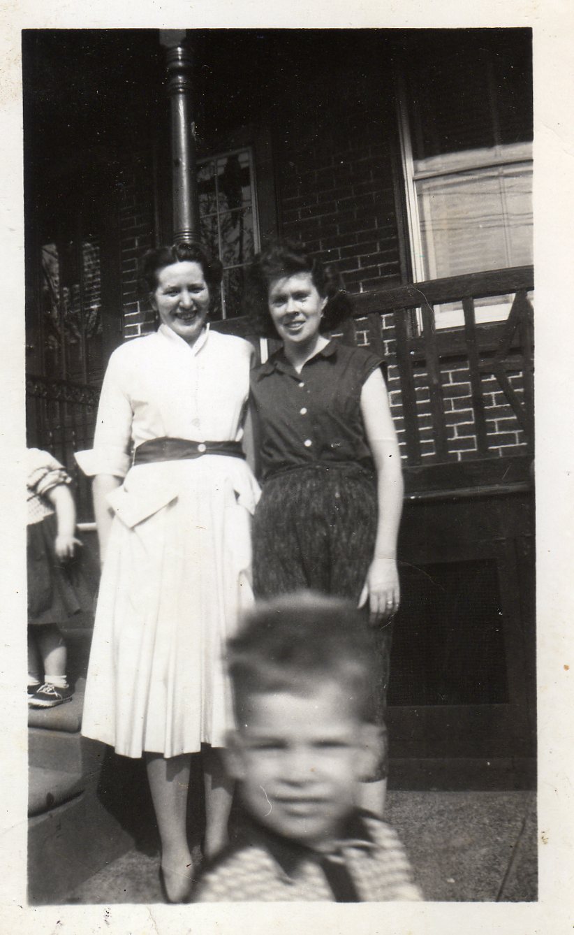 Theresa Burns & Mary Becoskie in front of the Burns house at 526 North 7th Street, next to Benny's grocery