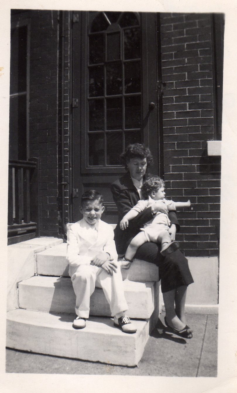 627 Elm Street steps — Mary Becoskie with son Michael 1953, Raymond Becoskie in his First Communion suit