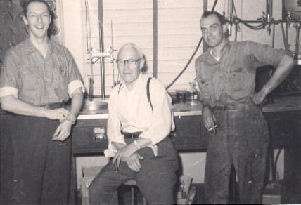 Edward Schaeffer (center) and unidentified employees at A.N. Stollwerck, circa 1940-50