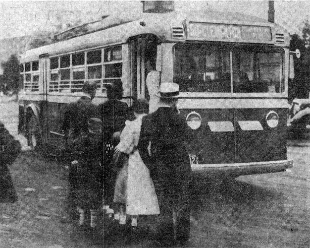 Camden Courier-Post, September 3, 1935 — Camdenites test shiny new trackless trolleys — customers boarding at the Federal Street ferry