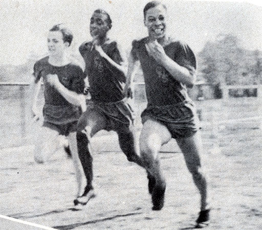 Track team action photo, Camden High School, 1944
