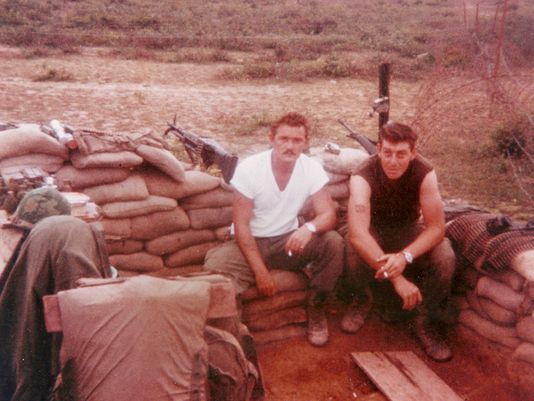 Army Cpl. James Castaldi, right, with fellow machine gunner William Port