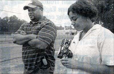Alexander Dixon Jr. and Christina Dixon remember their brother and uncle Anthony Dixon, Camden Courier-Post, August 2, 2004