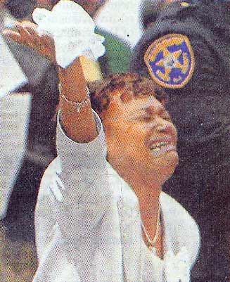 Jackie Dixon, the mother of Army Spec. Anthony Joseph Dixon, is overcome with emotion at his funeral, Camden Courier-Post, August 8, 2004