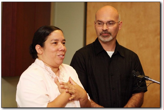 Maria Luisa Medina and Juan Casiano speak after a memorial service