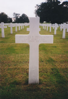 Grave marker of Staff Sgt. Charles E. Reynolds, Henri-Chapelle American Cemetery, Belgium