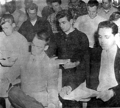 Attending Police Academy — Frank Crissey in plaid shirt