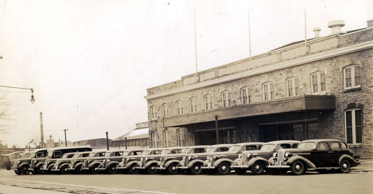 Camden Police Department vehicles lined up on Argonne Street in front of Convention Hall, late 1930s