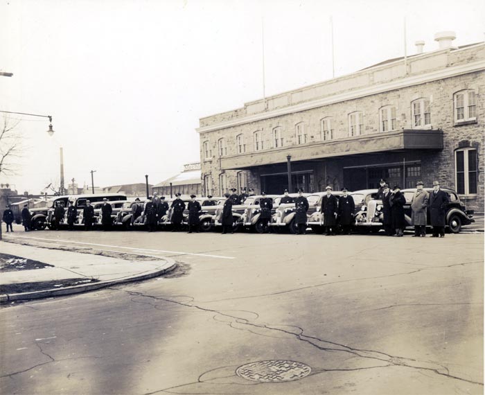 Camden Police Department vehicles and officials at Convention Hall, late 1930s