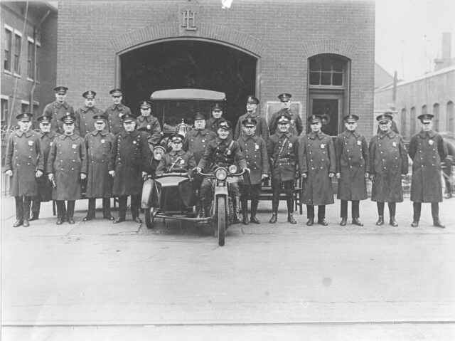 Camden Police at a firehouse, 1920s