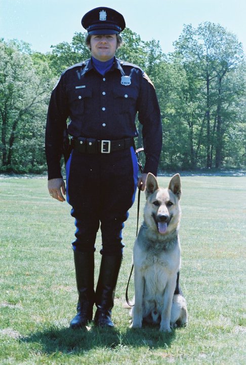 Officer Tom Kenuk (1950–2000) and his dog Bullet