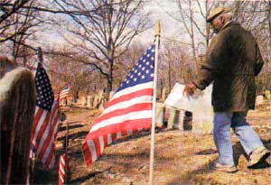 Bryson Armstead walks through Mount Peace Cemetery in Lawnside, where Civil War hero John Lawson's grave exists without a marker
