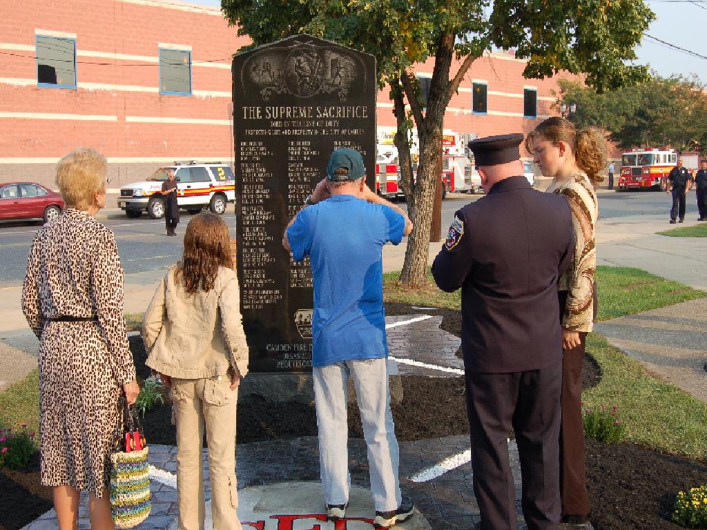 Ginny Shapleigh, granddaughter of Fire Fighter Joseph Ware, with Edward Glaze Jr. and the Glaze grandchildren, Camden Firemen's Memorial Dedication, 2006