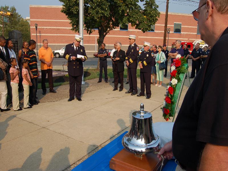 Chief Marini reading the names of the fallen, Lee Ryan at the bell, Camden Firemen's Memorial Dedication, 2006
