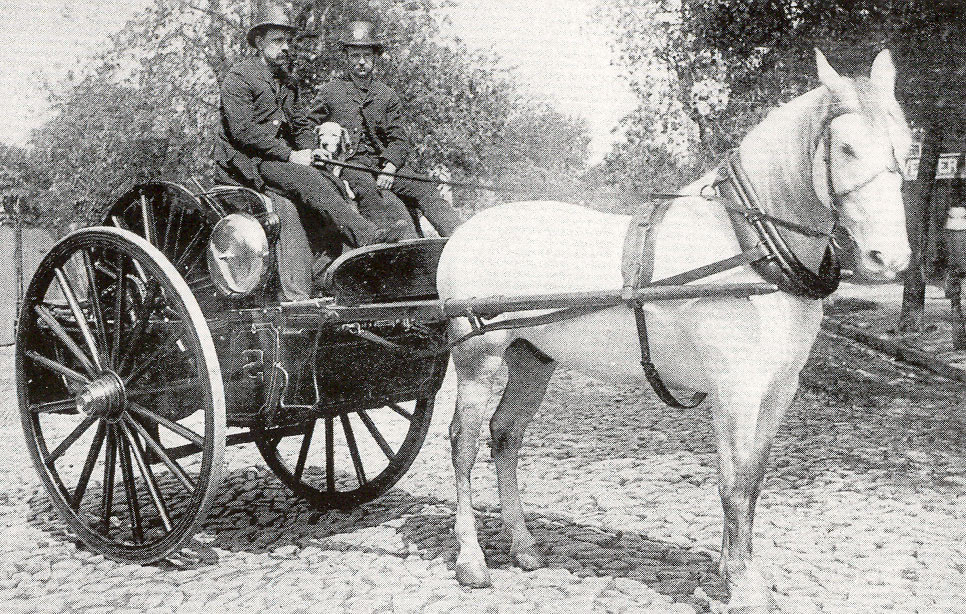 Engine Company 1 with its two-wheeled Silsby hose cart, 409 Pine Street, South Camden, 1893