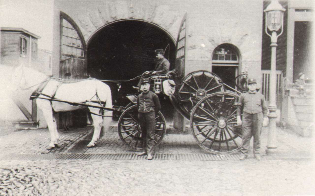 Engine Company 1 and its Silsby hose cart, 409 Pine Street, 1890s