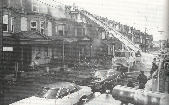 1983 Mack 75 Foot Tower Ladder on State Street, North Camden — about 1990