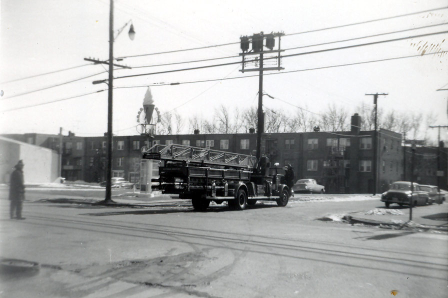 Camden Fire Department Engine Company 3 turning south onto Westminster Street from 100 block of Marlton Avenue, May 1960, Carvel Ice Cream stand at 175 Marlton visible in background
