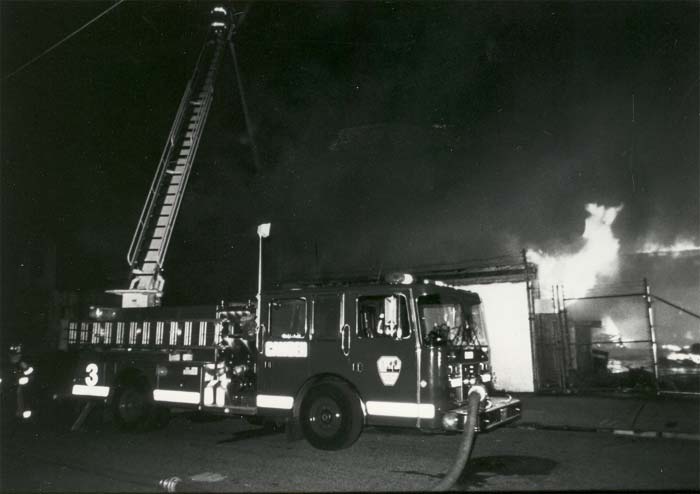 1976 Maxim F Series 100 foot Tiller Aerial Ladder, Ladder Company 3 — second night view