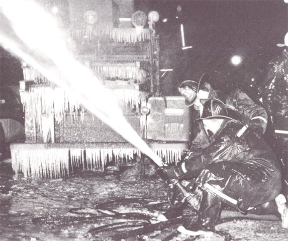 Firemen direct exterior streams at Walmart fire, Broadway and Chestnut Streets, January 14, 1964