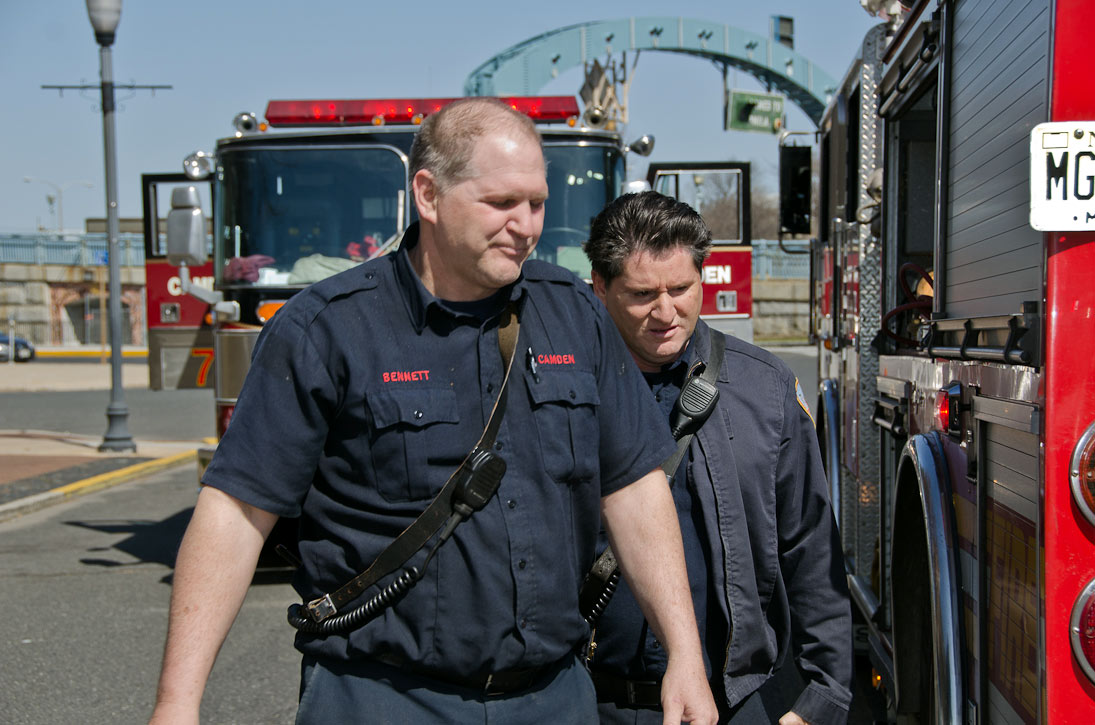 Howard Bennett and Gabe Rivera at the scene of a fire on Rutgers Street, March 14, 2012