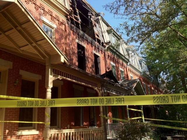A fire in a vacant dwelling on Chambers Avenue in Camden spread to Freeholder Scot McCray's home, June 16, 2012