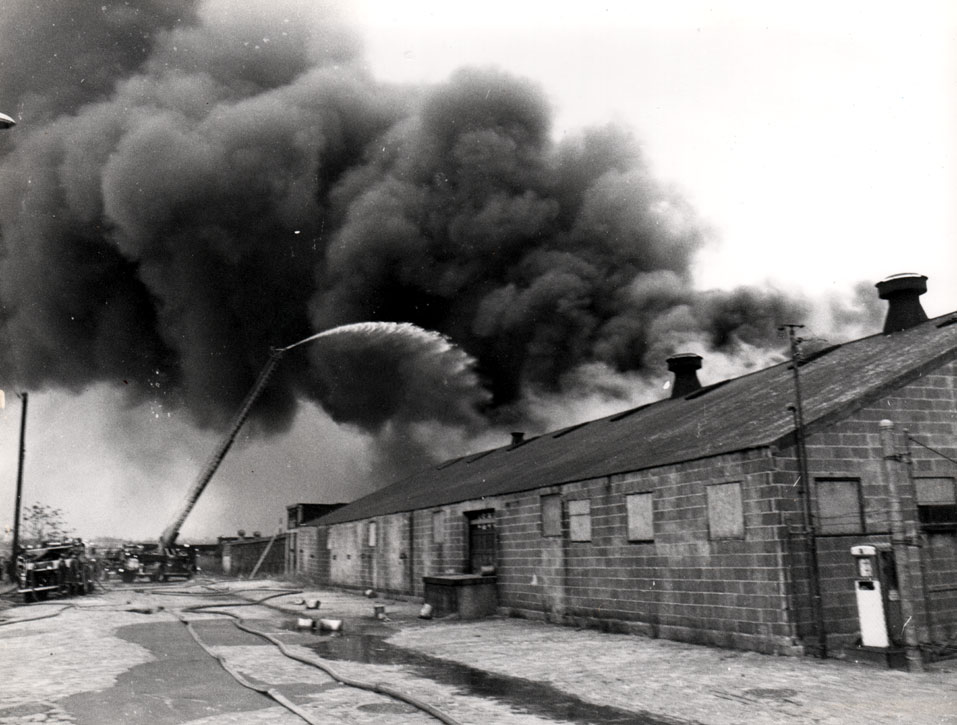 Ladder Company 3 gets water on fire at the John R. Evans Leather Company, December 19, 1971