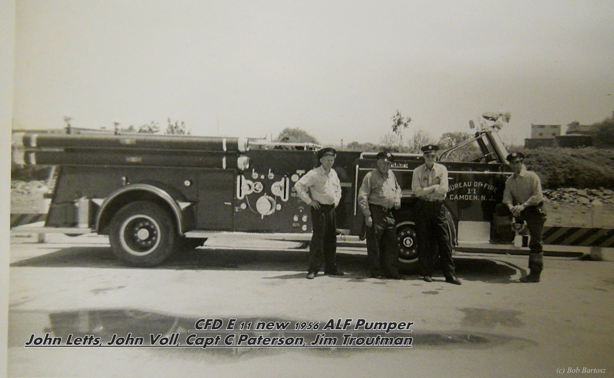 Engine 11's 1956 American LaFrance Pumper — From left: John Letts, John C. Voll, Captain Charles Patterson, James Troutman