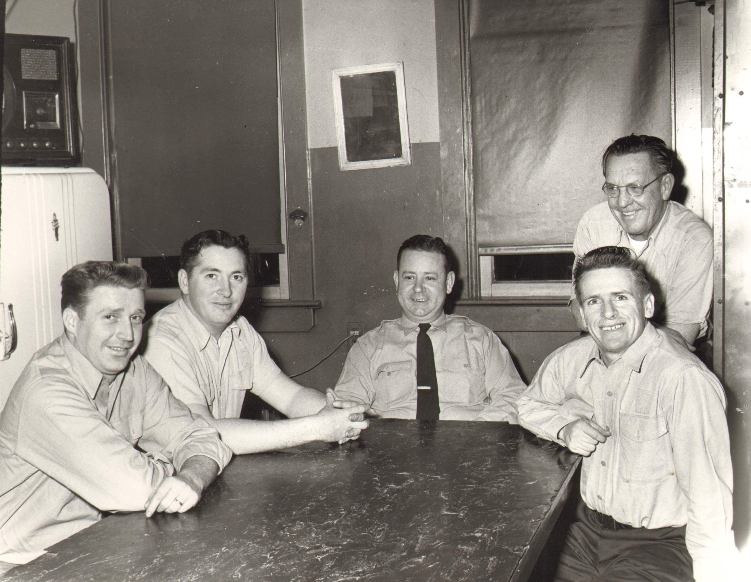 Engine Company 11, 1958 — Seated: Fireman Matthew Davies, Fireman Frank Deal, Captain Edwin Robbins, Fireman William O'Connor. Standing: Fireman Harry J. Allebach