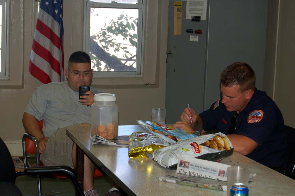 Dave Hernandez of phillyfirenews.com and Firefighter Daniel Seybert, Squad Company 7 100th anniversary, July 1, 2010