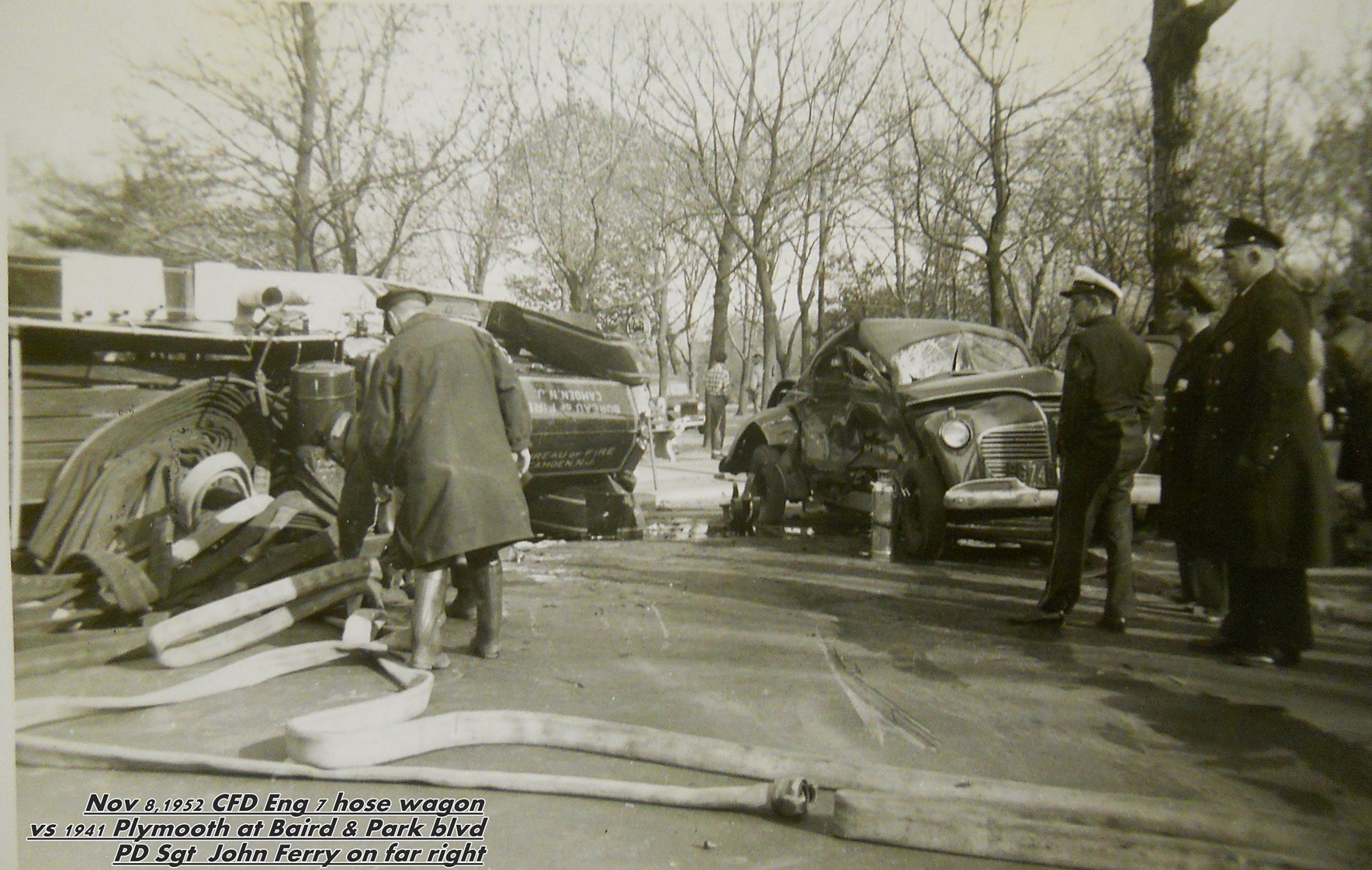 Camden Fire Department Engine Company 7 hose wagon vs. 1941 Plymouth at Baird Avenue and Park Boulevard, November 8, 1952 — Sergeant John Ferry at far right