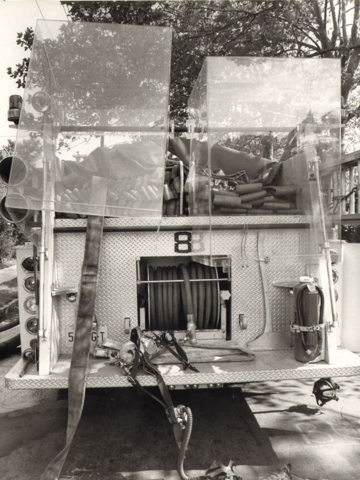 Plexiglass mounted on Engine Company 8 apparatus to protect firefighters from vandalism, September 9, 1977